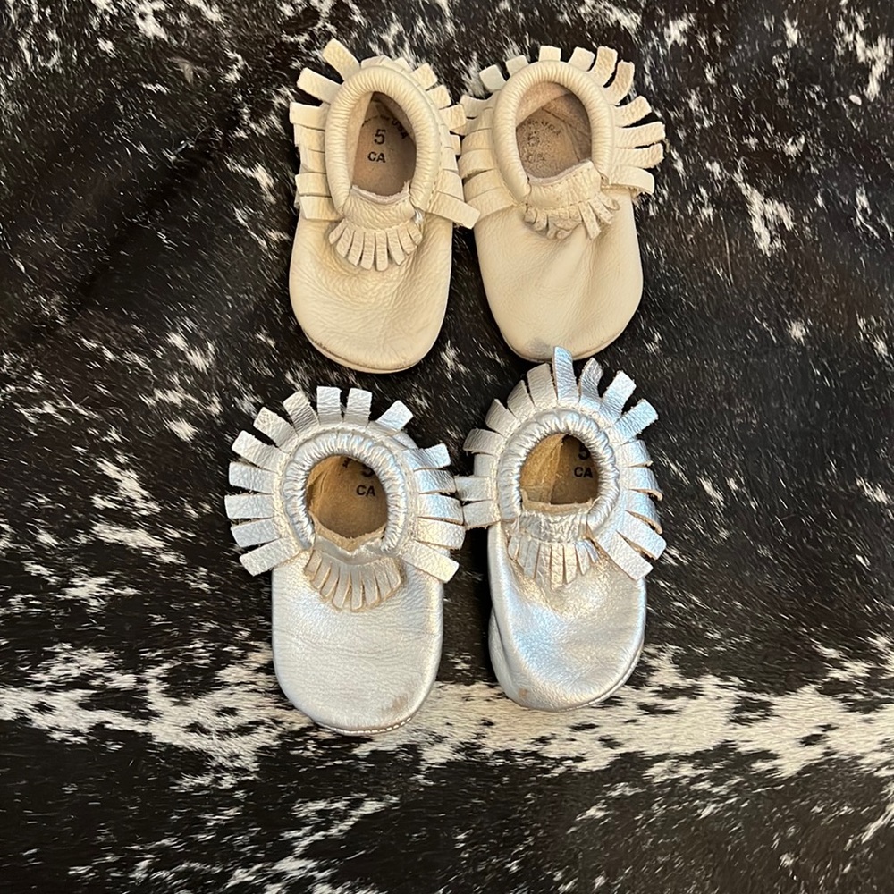 2 pairs of size 5 freshly picked soft soles in play condition.